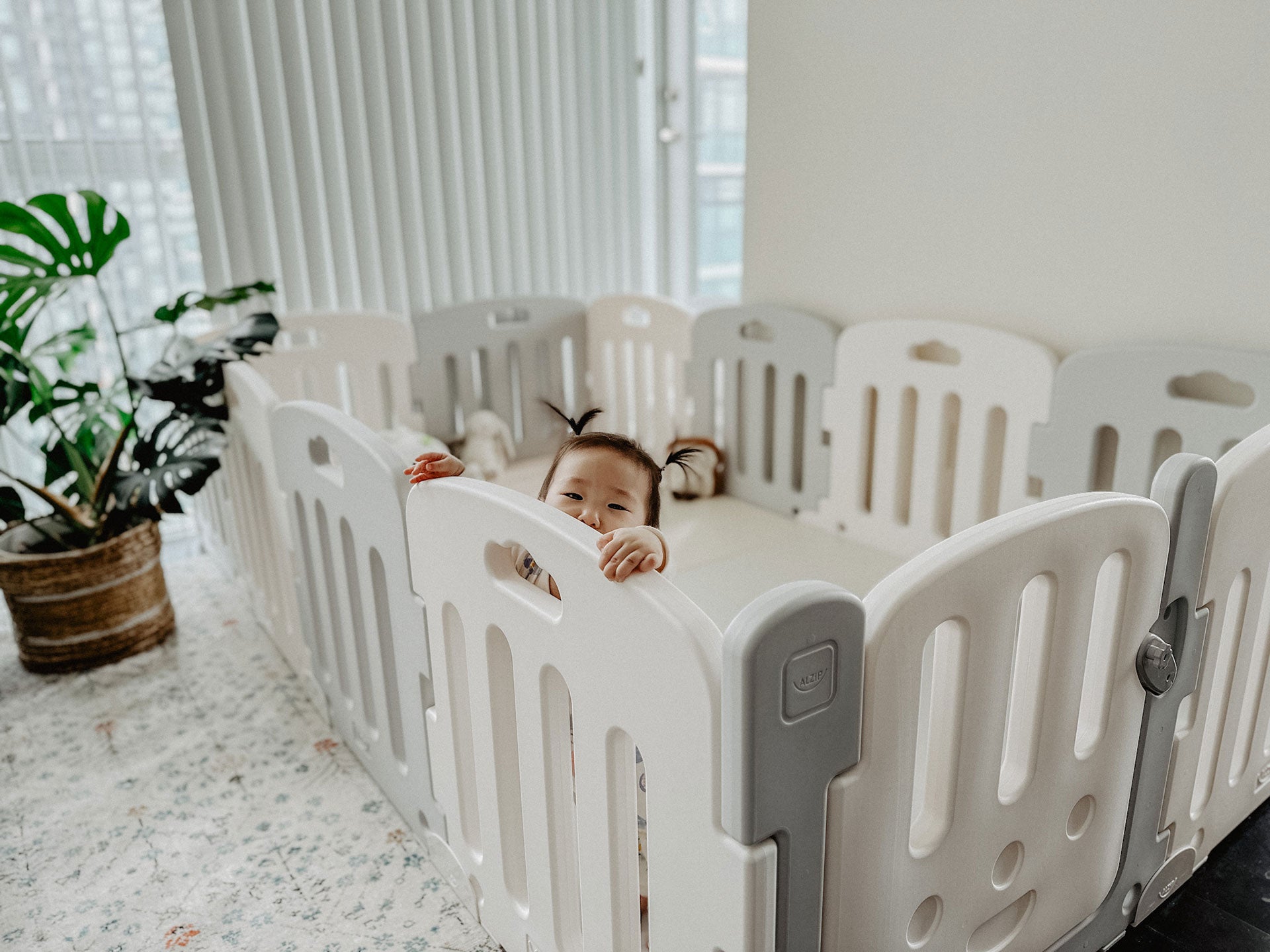 Baby climbing out of playpen hotsell